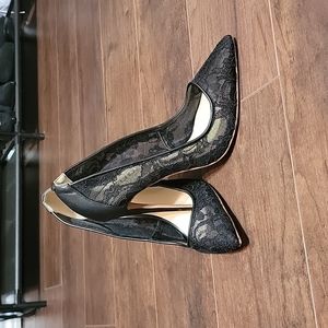 Black lace stiletto pumps